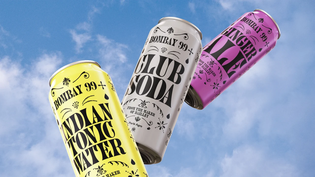Three yellow, white and pink Bombay 99 cans float diagonally against a cloudy blue sky, presenting the mixer family.