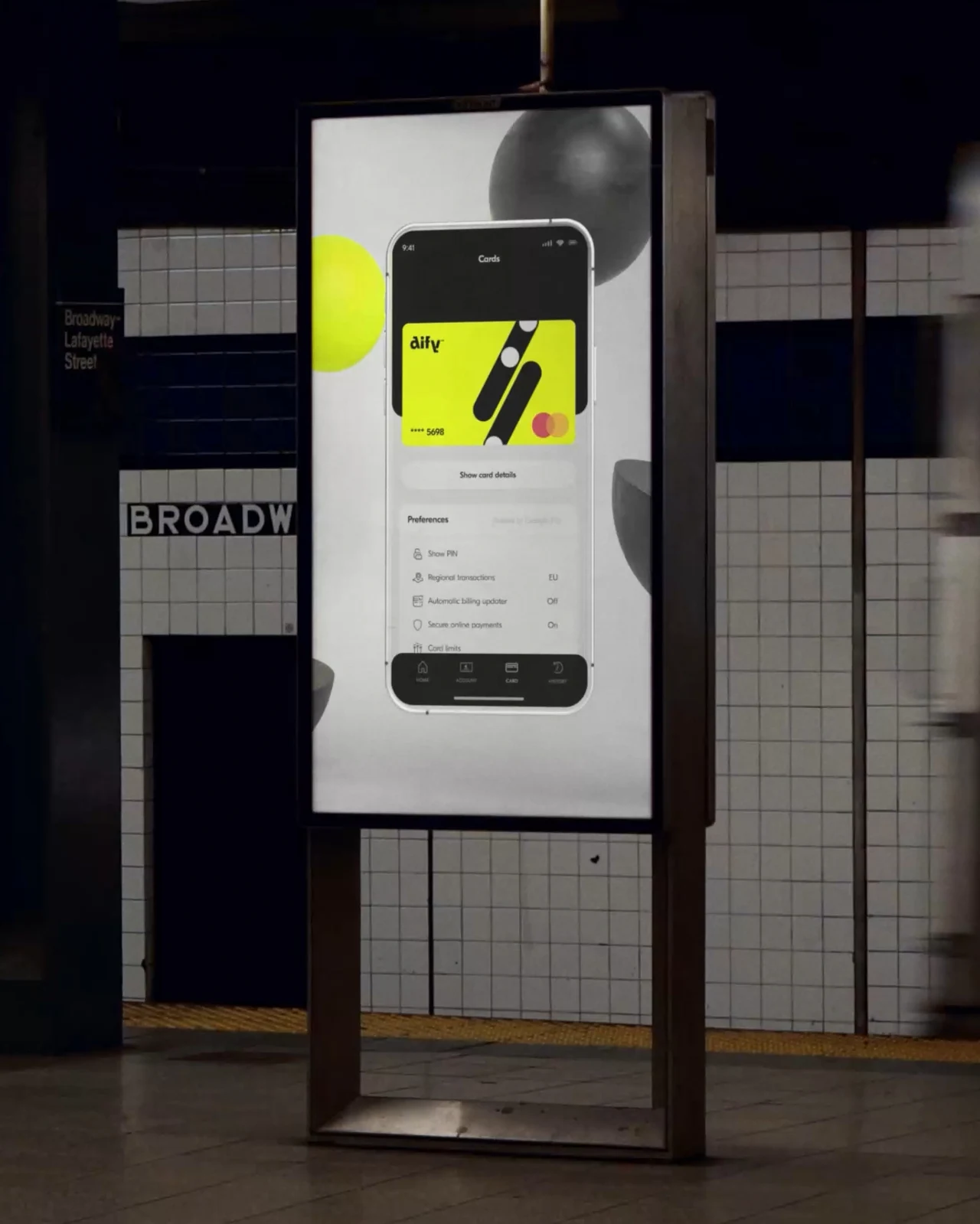 An advertising panel in a subway station shows a phone with Dify’s yellow card and financial interface.