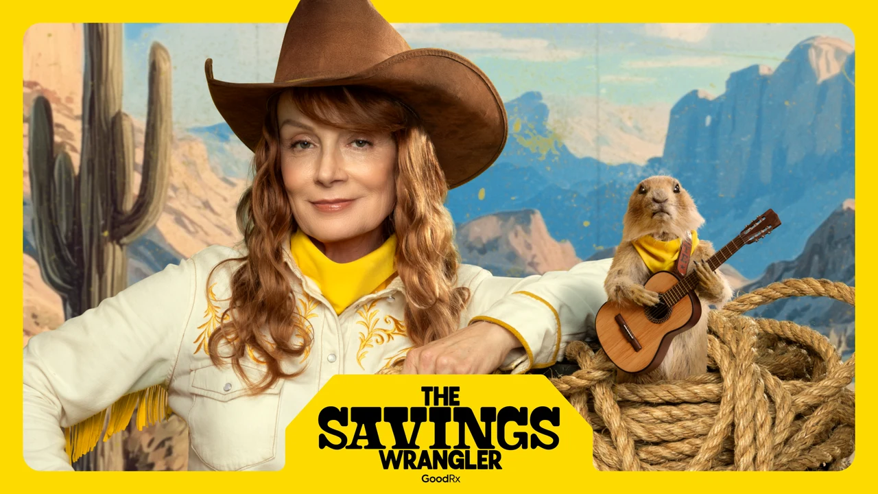 Yellow-framed ad with the cowgirl leaning on a coil of rope beside a prairie dog playing a tiny guitar, in front of a painted desert with cacti, and The Savings Wrangler lockup.