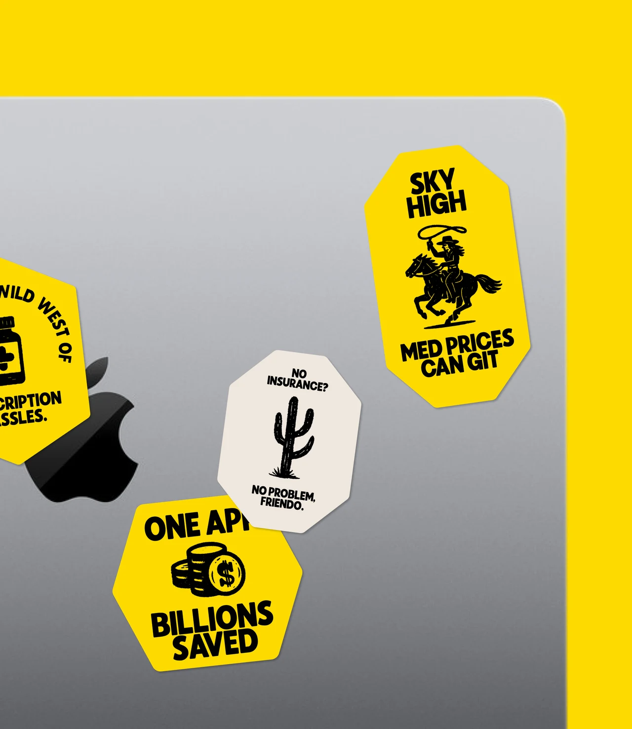 Yellow GoodRx badge stickers on a silver laptop lid: Sky High Med Prices Can Git, No Insurance? No Problem, Friendo, One App Billions Saved and Wild West.
