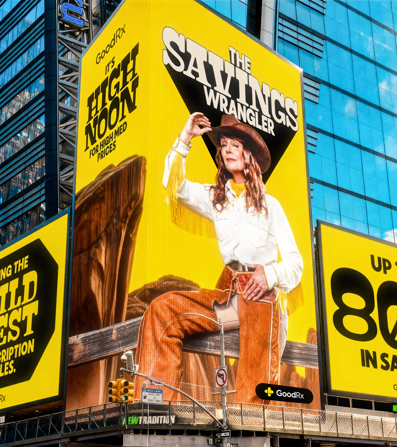 Vertical view of a digital billboard on a glass tower for The Savings Wrangler: a cowgirl in a white fringed shirt, hat and leather chaps sits on a fence beside It's High Noon for High Med Prices.