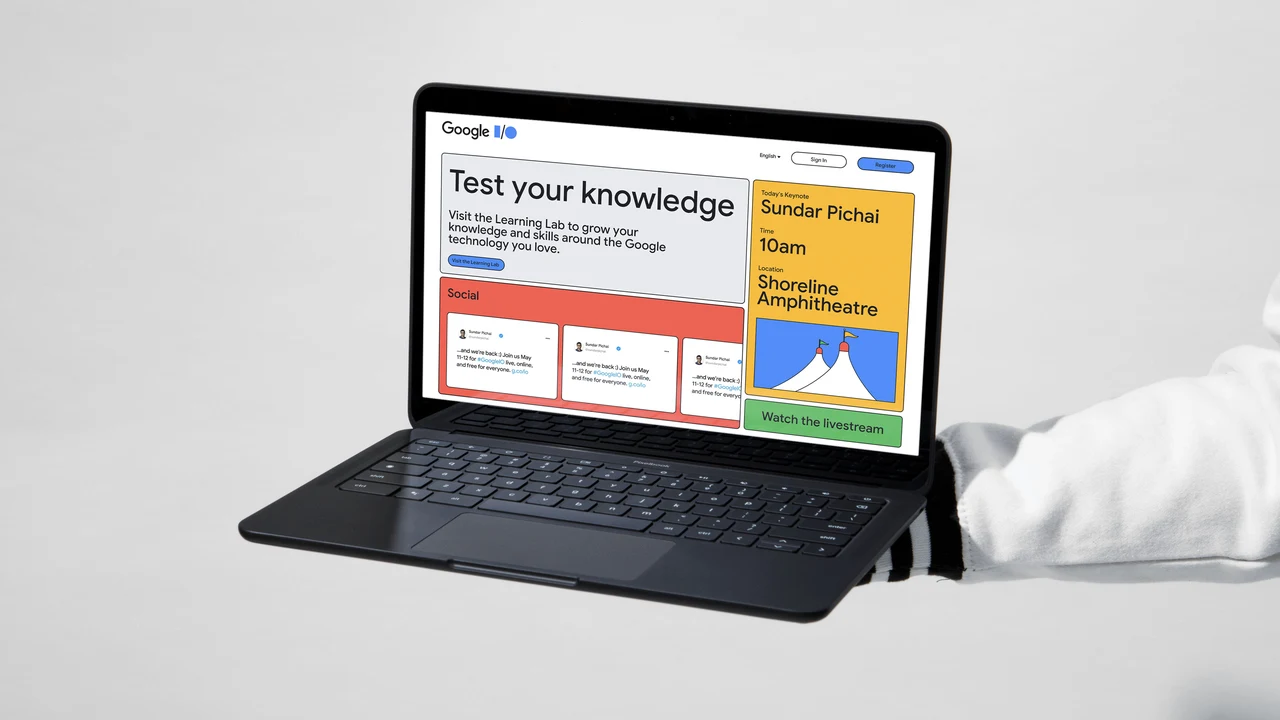 Tablet com teclado exibe uma página Google I/O com seção “Test your knowledge”, cartões de conteúdo e um bloco amarelo de programação de palestrante.
