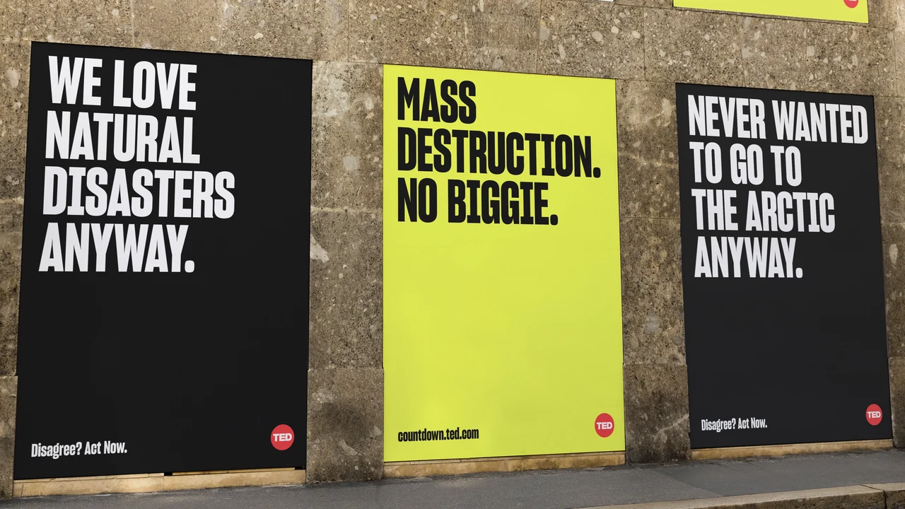 Three posters on a rough wall alternate black and lime yellow with condensed messages about disasters, destruction and the Arctic.