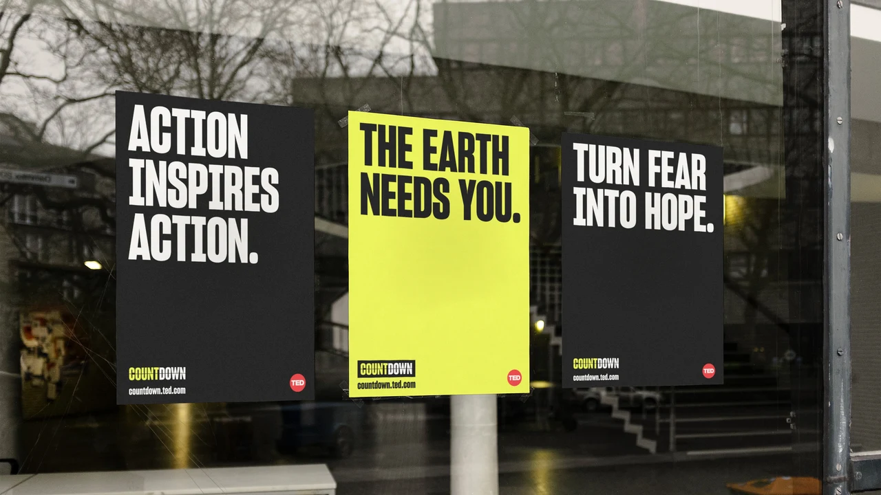 Three window posters alternate black and lime yellow with Action inspires action, The earth needs you and Turn fear into hope.