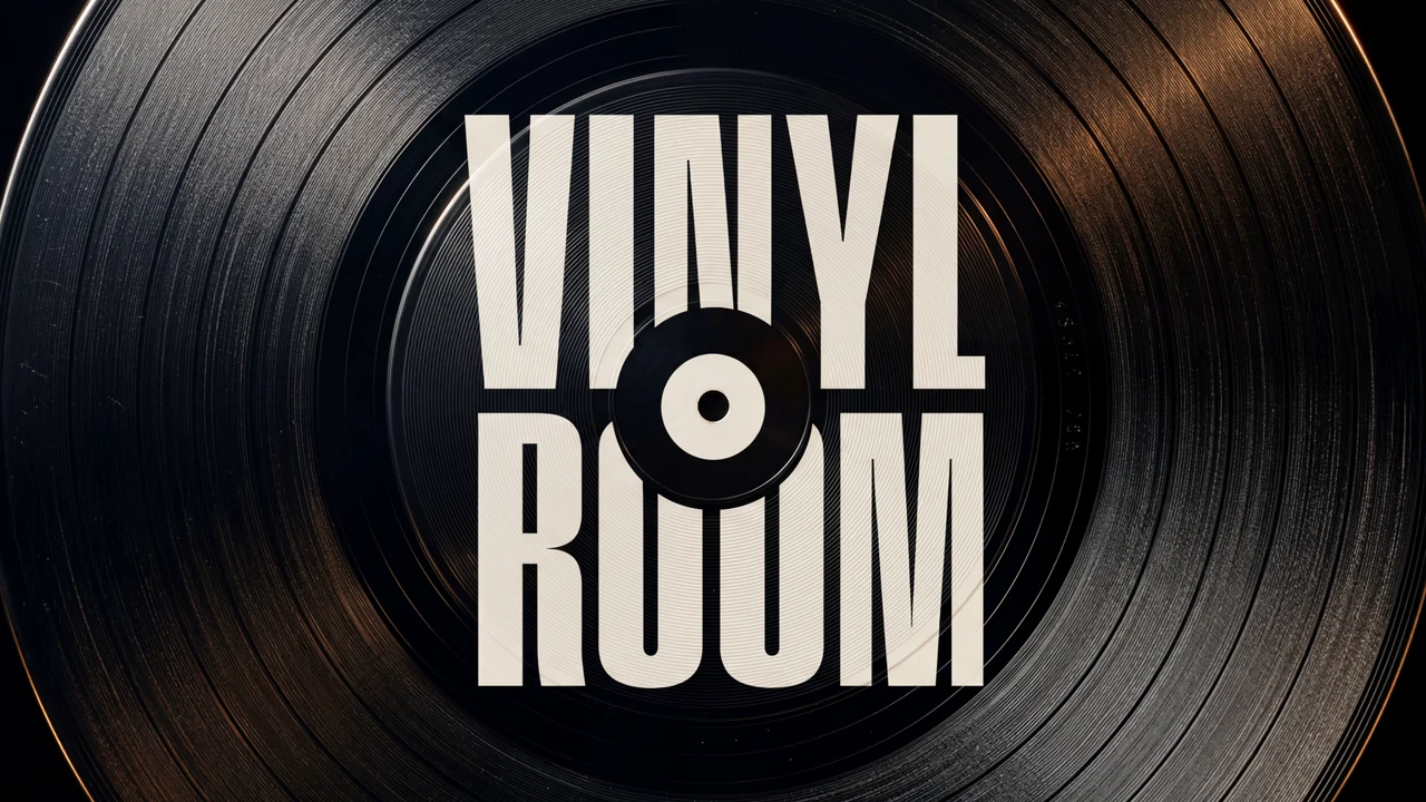 Cream VINYL ROOM wordmark with a record-shaped O set over a close-up of a black vinyl record's grooves.